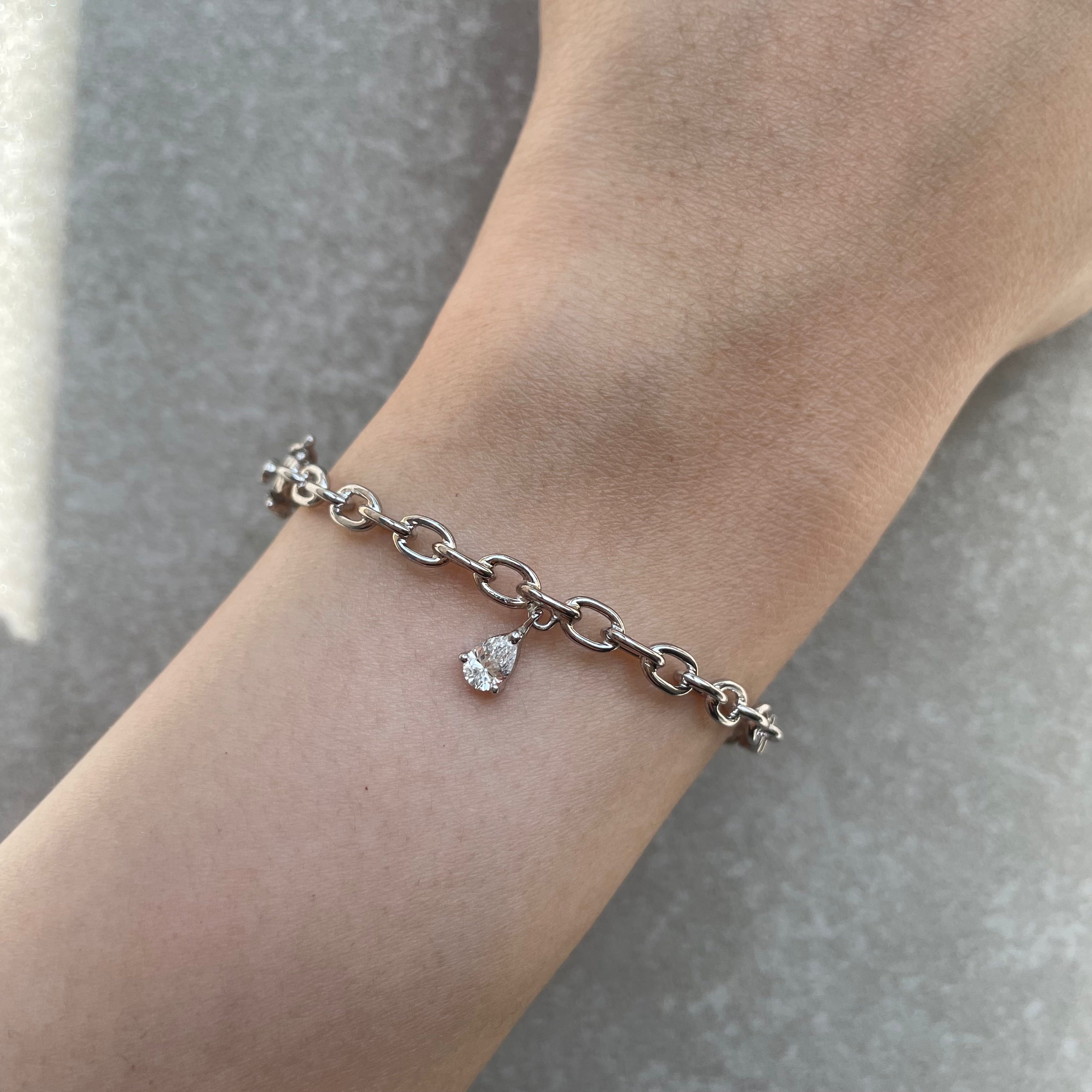 WHITE GOLD TRAILBLAZER BANGLE WITH PEAR DIAMOND CHARM